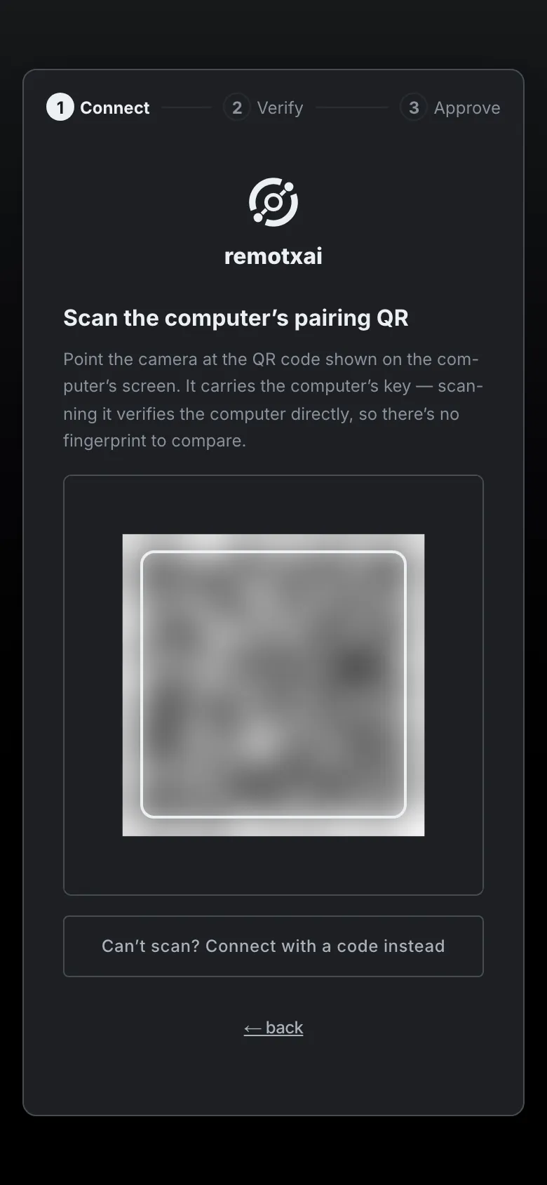 A camera view scanning the computer's pairing QR.